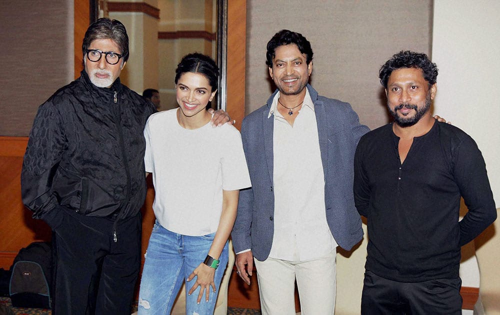 Bollywood actors Amitabh Bachchan, Deepika Padukone, Irrfan Khan and Director Shoojit Sircar during the promotion of film Piku in Mumbai.