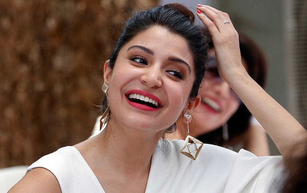 Bollywood actress Anushka Sharma smiles during the song launch of the upcoming movie ‘Dil Dhadakne Do’ in Mumbai.