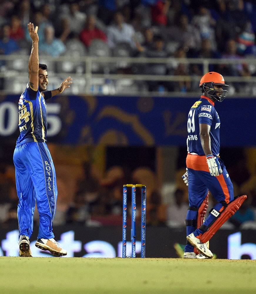 Rajasthan Royals player Stuart Binny celebrates the wicket of Angelo Mahews during an IPL match in Mumbai.