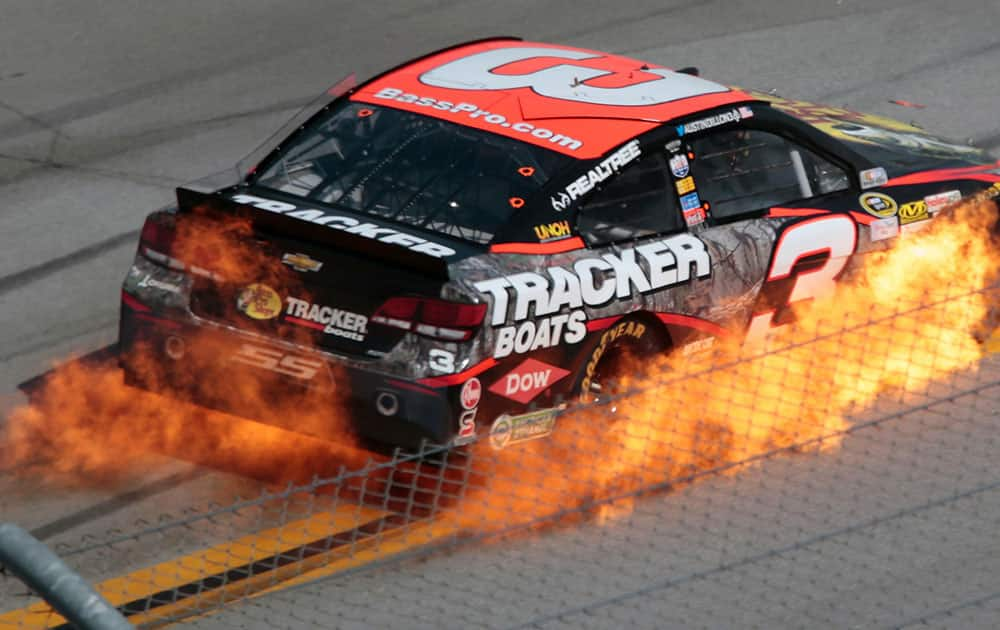 Austin Dillon's car catches fire during the Talladega 500 NASCAR Sprint Cup Series auto race at Talladega Superspeedway, in Talladega, Ala.