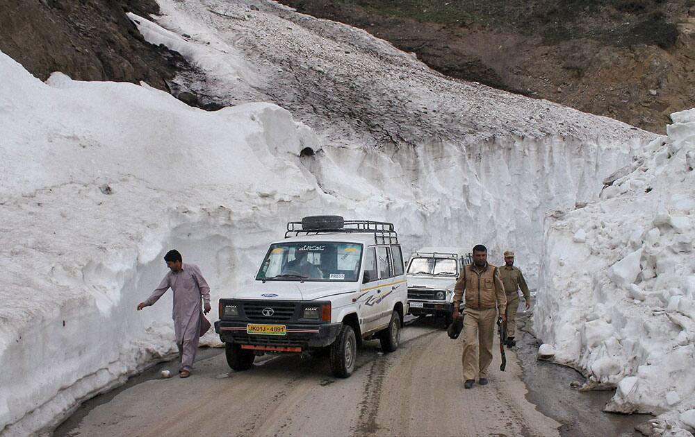Vehicles at Mughal road after it was opened for one-way traffic, thus connecting Shopian and Poonch district.