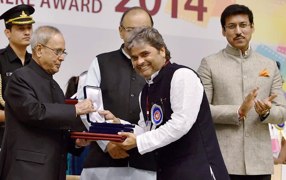 President Pranab Mukherjee presenting 62nd National Film Award for Best music direction for film Haider to Vishal Bhardwaj at the award ceremony in New Delhi.