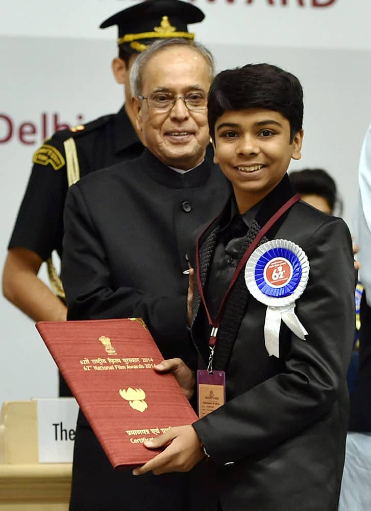 President Pranab Mukherjee presenting 62nd National Film Award to Special mention award to Parth Bhalerao at the award ceremony in New Delhi.