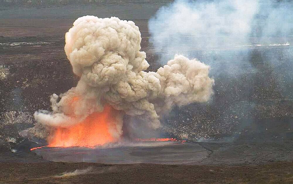 This photo provided by US Geological Survey Hawaiian Volcano Observatory, smoke and lava explode from Kilauea volcano on Hawaii’s Big Island.