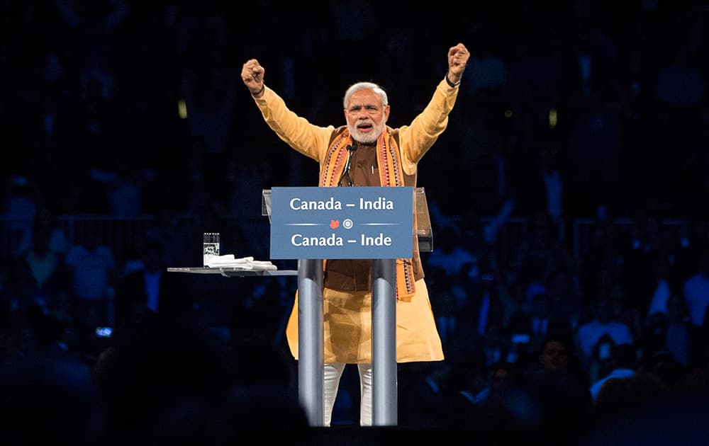Prime Minister Narendra Modi addresses the crowd during an event in Toronto.