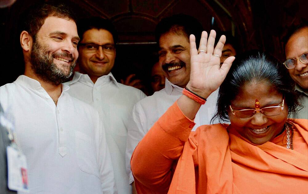 Congress Vice President Rahul Gandhi and MoS Sadhvi Niranjan Jyoti at Parliament house in New Delhi.