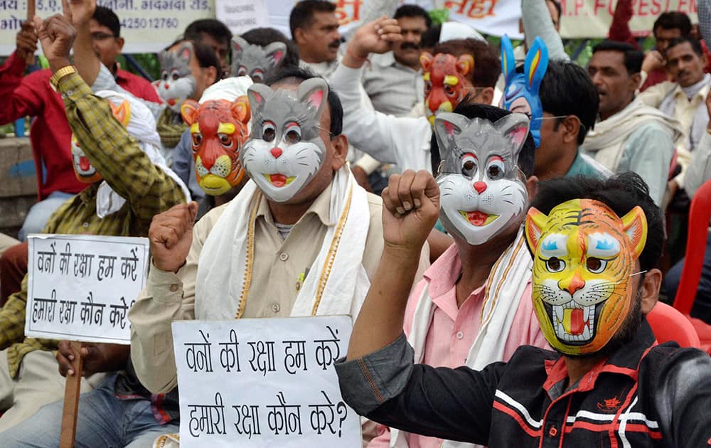 Daily Wage Forest Employees statging day long dharna with wild animal masks, demanding regularisation of their jobs in Bhopal.