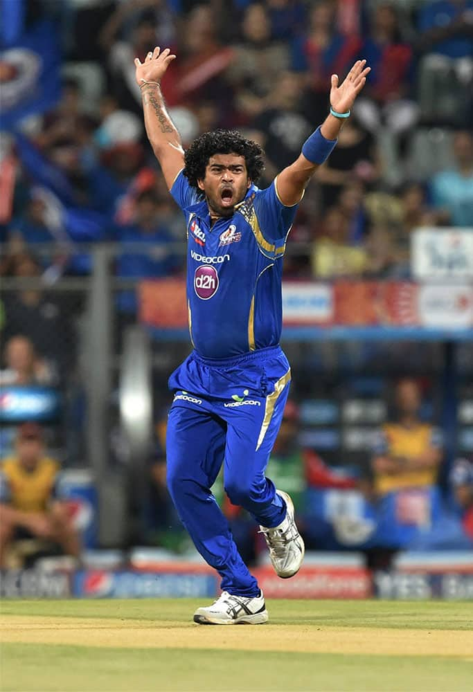 Mumbai Indians Lasith Malinga celebrates the wicket of Delhi Daredevils batsman Mayank Agarwal during their IPL T20 match in Mumbai.