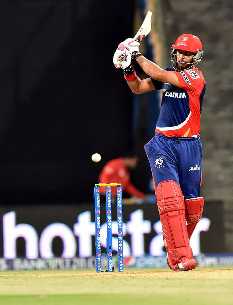 Delhi Daredevils batsman Yuvraj Singh plays a shot against Mumbai Indians during the IPL T20 match in Mumbai.