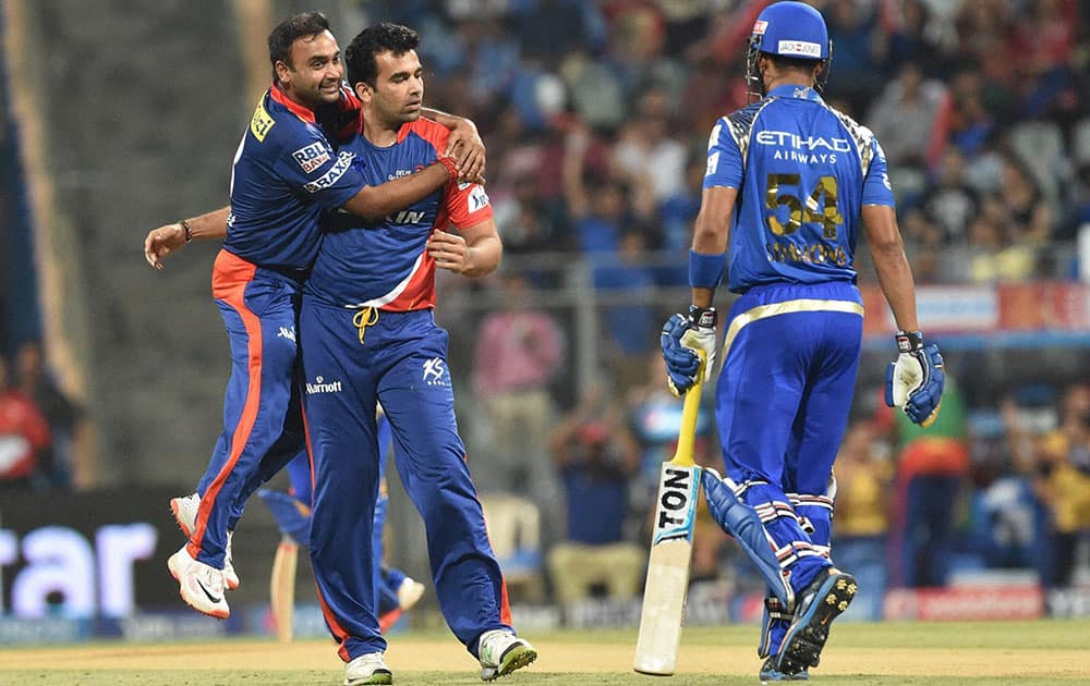 Delhi Daredevils bowler Zahir Khan celebrates the wicket of Mumbai Indians batsman L Simmons during a IPL T20 match played in Mumbai.