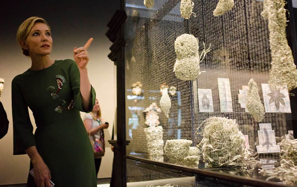 Actress Cate Blanchett looks at artworks on display during the inauguration of the Australian pavilion at the 56th Biennale of Arts in Venice.