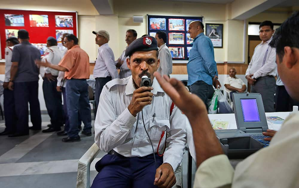 A Delhi Traffic Police constable undergoes a spirometry test to help diagnose lung conditions at a medical camp conducted for traffic policemen with particular stress on respiratory problems, in New Delhi.