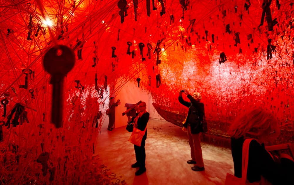 Thousands of keys hang in the Japanese pavilion part of Japanese artist Chiharu Shiota installation 'The Key in the Hand' at the 56th Biennale of Arts in Venice.