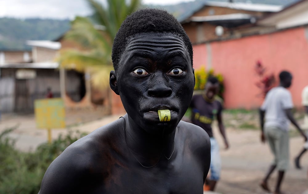 A Demonstrator blows his whistle in the Kanyosha district of Bujumbura, Burundi.