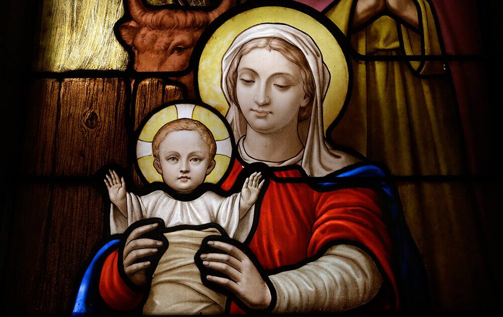 This photo shows a detail of a newly-restored stained glass panel of the Madonna and Child at St. Patrick's Cathedral in New York. The cathedral's stained glass is being restored by Botti Studio of Architectural Arts based in Evanston, Ill. as part of the of the ongoing $175 million restoration.