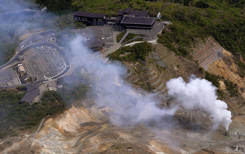 White smoke is spewed out in Owakudani valley of Mount. Hakone where increased earthquake activity is found, in Hakone town, about 80 kilometers (50 miles) southwest of Tokyo.