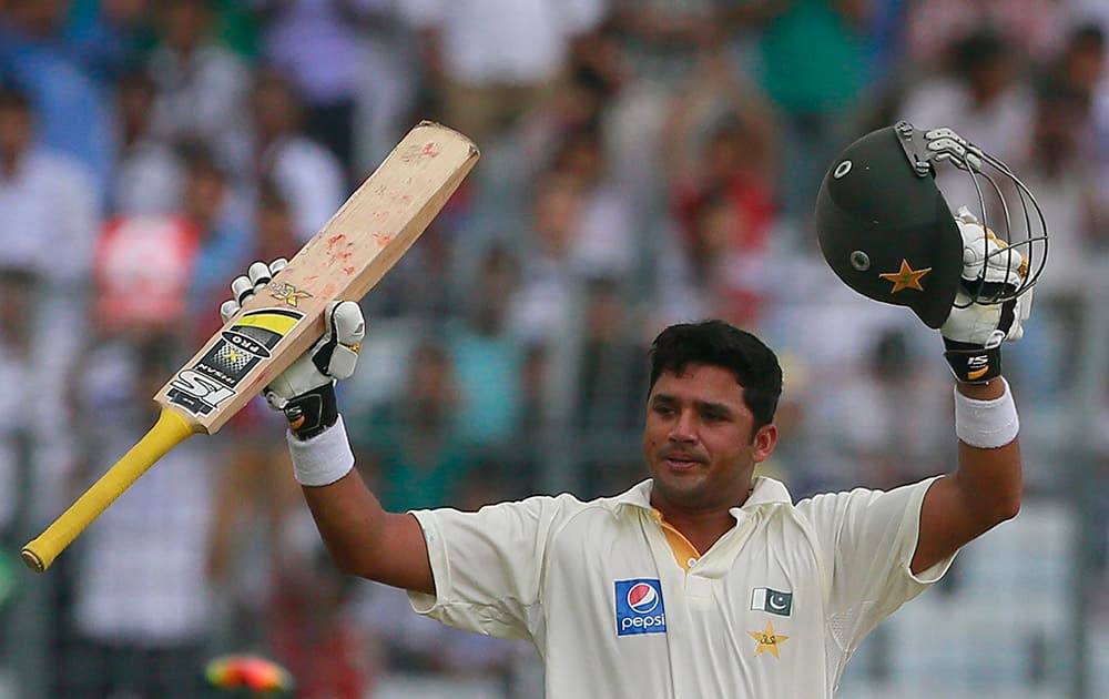 Pakistan’s Azhar Ali celebrates after scoring a double century on the second day of the second test cricket match against Bangladesh in Dhaka.