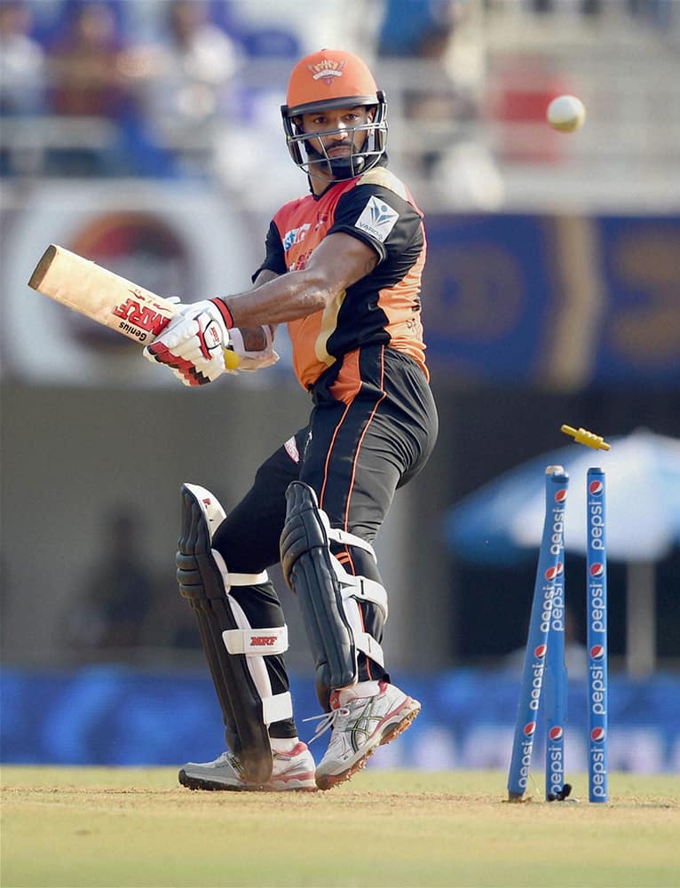 Sunrisers Hyderabad player Shikhar Dhawan is bowled out during their IPL match against Rajasthan Royals in Mumbai.