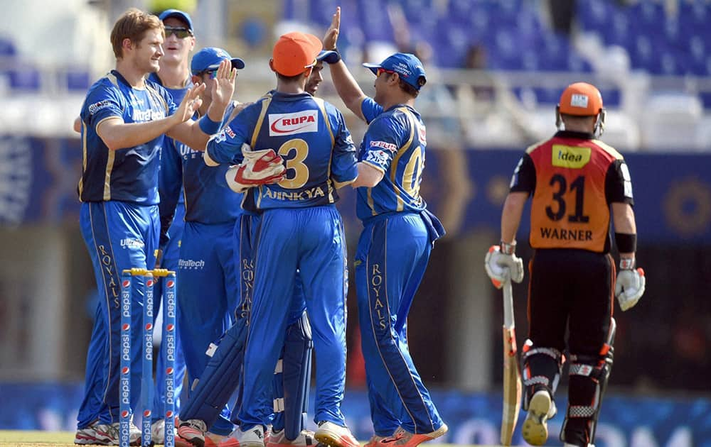 Rajasthan Royals players celebrate the wicket of SRHs David Warner during their IPL match in Mumbai.