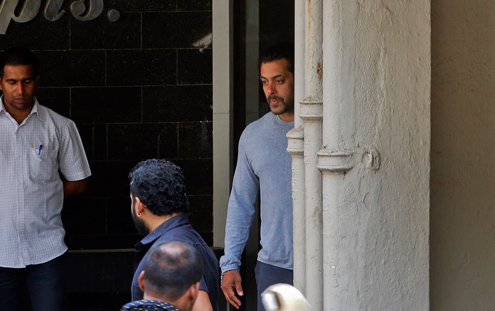 Salman Khan comes out of his residence to see off a guest in Mumbai.