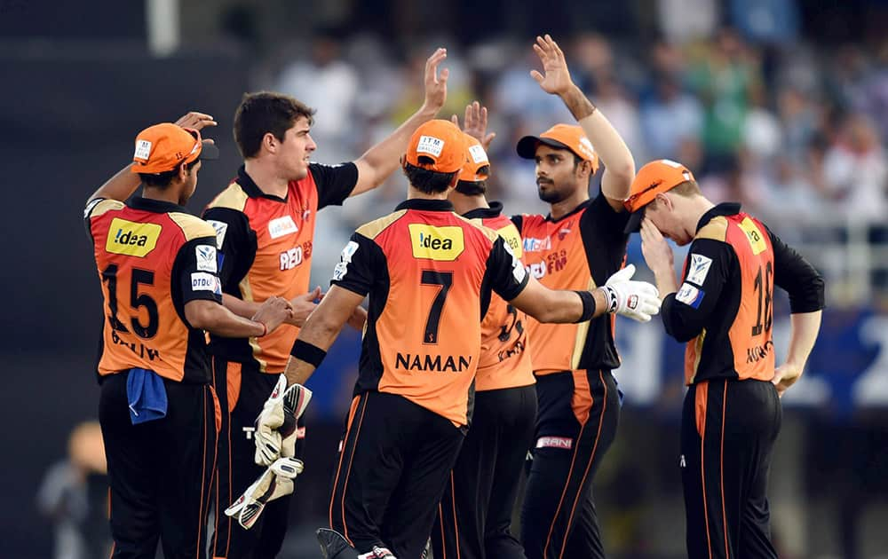 Sunrisers Hyderabad players celebrate the wicket of RRs Karun Nair during their IPL match in Mumbai.