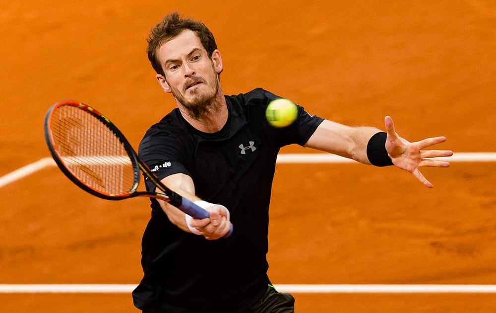 Britain's Andy Murray returns the ball during his Madrid Open tennis tournament match against Marcel Granollers from Spain in Madrid