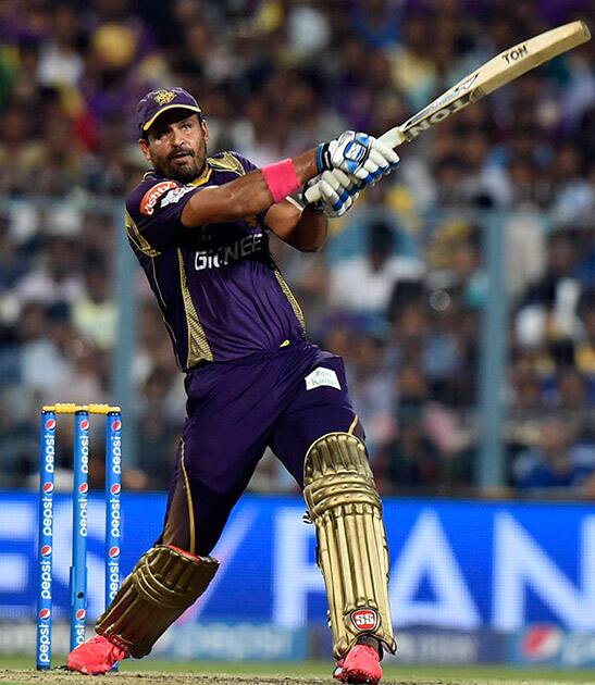 KKRs batsman Yusuf Pathan plays a shot during the IPL match aganist Delhi Daredevils at Eden Garden in Kolkata.