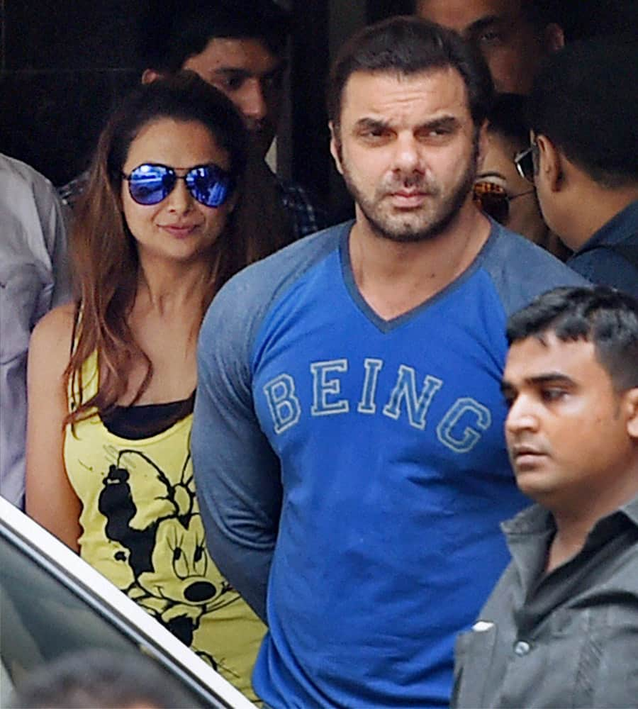 Sohail Khan and Amrita Arora leave from Salman Khans residence in Mumbai. The Bombay High Court on Friday suspended Salman Khans five year prison sentence in the hit-and-run case. 