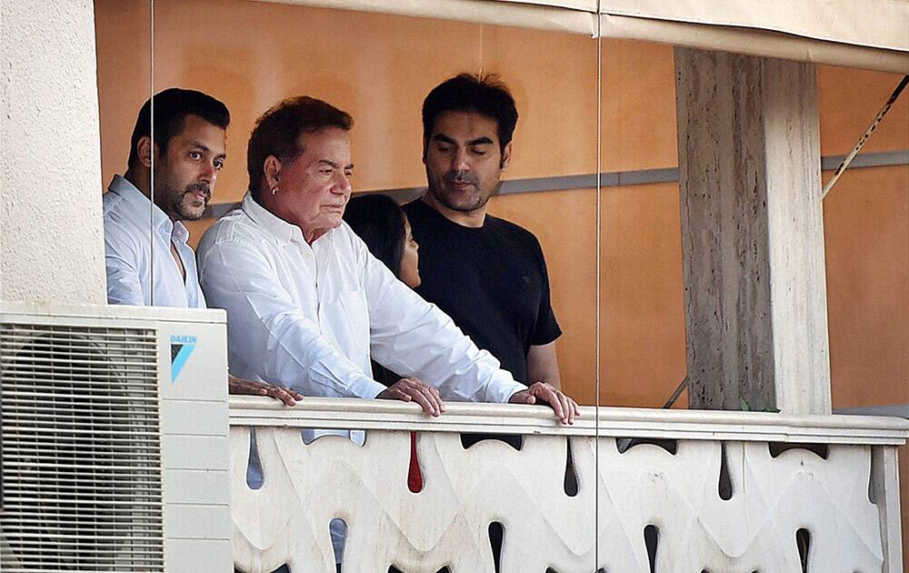 Salman Khan with father Salim Khan and brother at his residence after returning from the Sessions court in Mumbai.