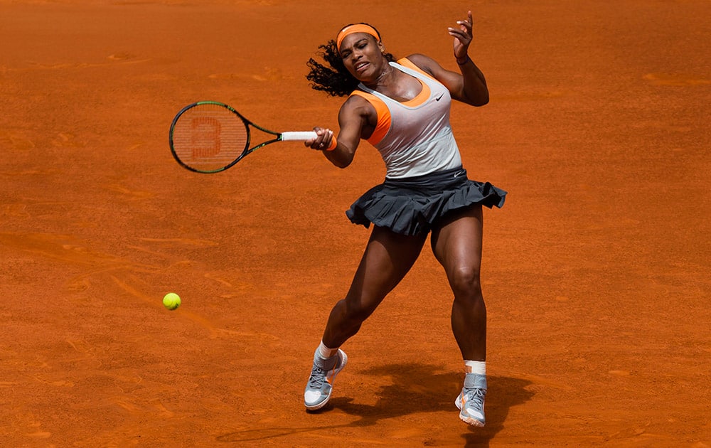 Serena Williams from U.S. returns the ball during her Madrid Open tennis tournament match against Petra Kvitova from Czech Republic in Madrid, Spain.