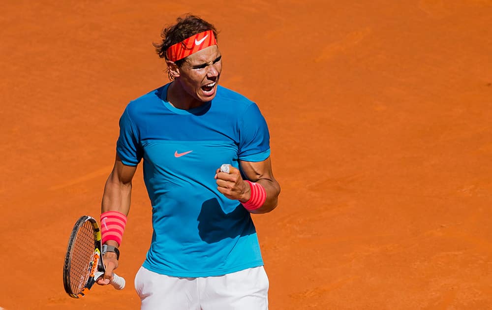 Rafael Nadal from Spain celebrates after winning his Madrid Open tennis tournament match against Grigor Dimitrov from Bulgaria in Madrid, Spain.