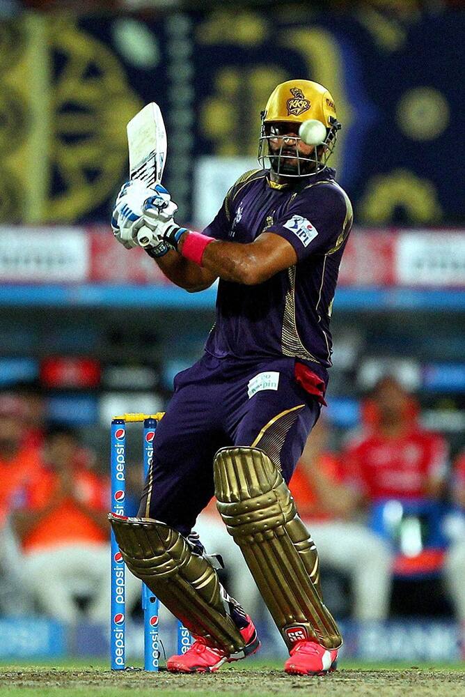 Yusuf Pathan of the Kolkata Knight Riders keeps his eye on the ball during IPL match against Kings XI Punjab in Kolkata.