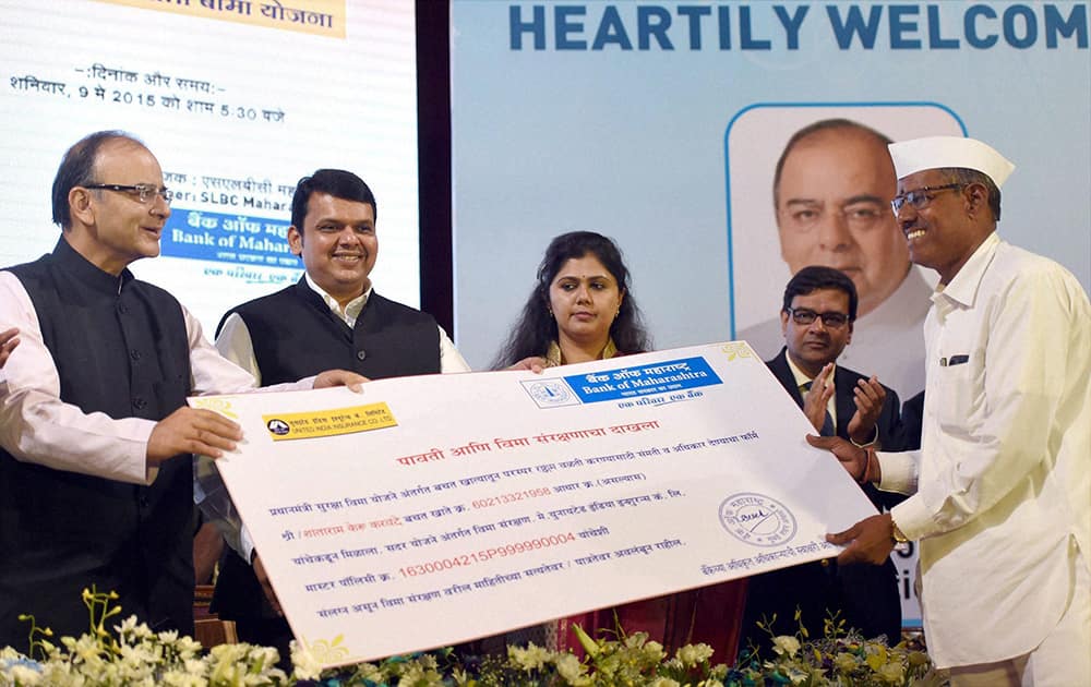 Arun Jaitley, Union Minister of Finance and Corporate Affairs and Maharashtra Chief Minister, Devendra Fadnavis during the launch of Pradhan Mantri Suraksha Bima Yojana, Atal Pension Yojana and Pradhan Mantri Jeevan Jyoti Bima Yojana in Mumbai.