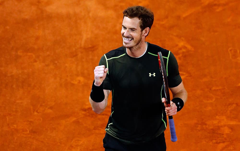 Andy Murray of Great Britain celebrates after winning his semifinal match with Kei Nishikori of Japan at the Madrid Open Tennis tournament.