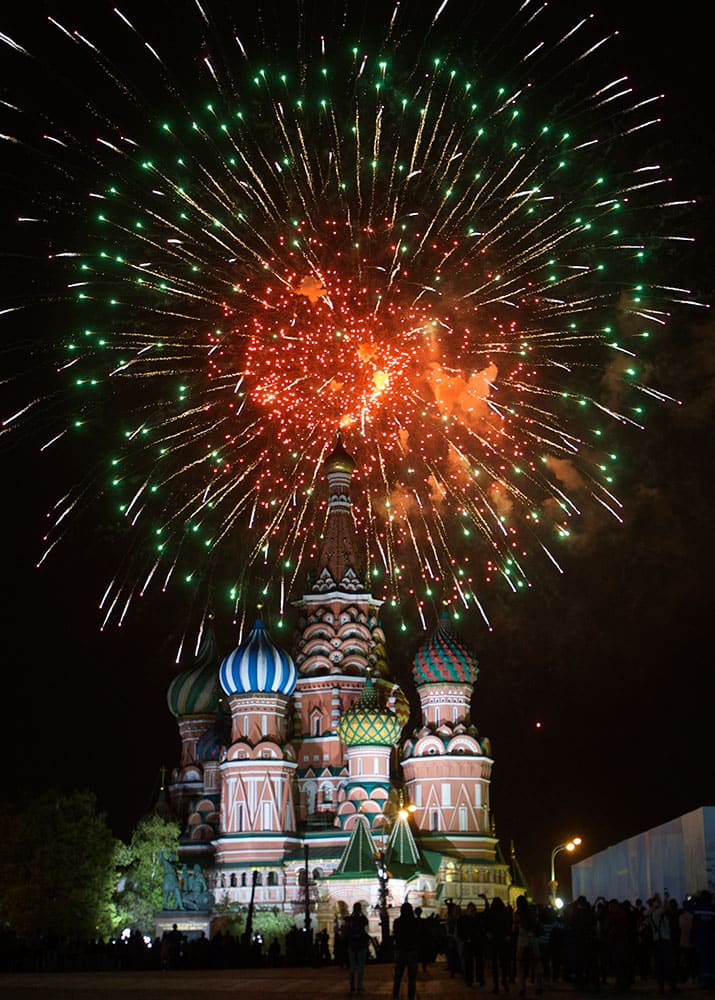 Fireworks explode over St. Basil Cathedral at the Red Square in Moscow, Russia, marking the 70th anniversary of the defeat of the Nazi Germany in World War II.