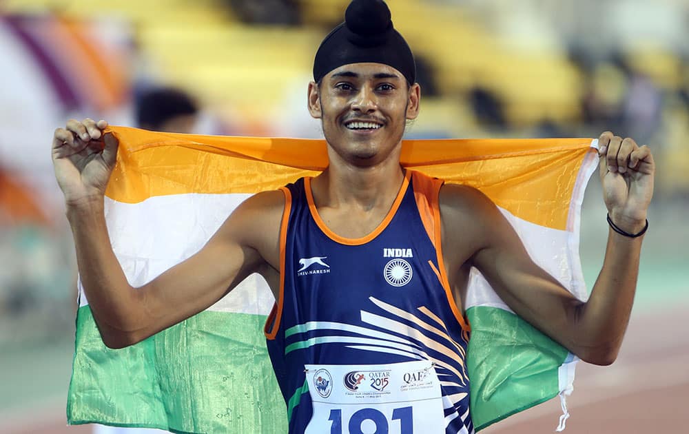 Beant Sinch of India celebrates winning the 800m at the Asian Youth Athletics Championships in Doha, Qatar.