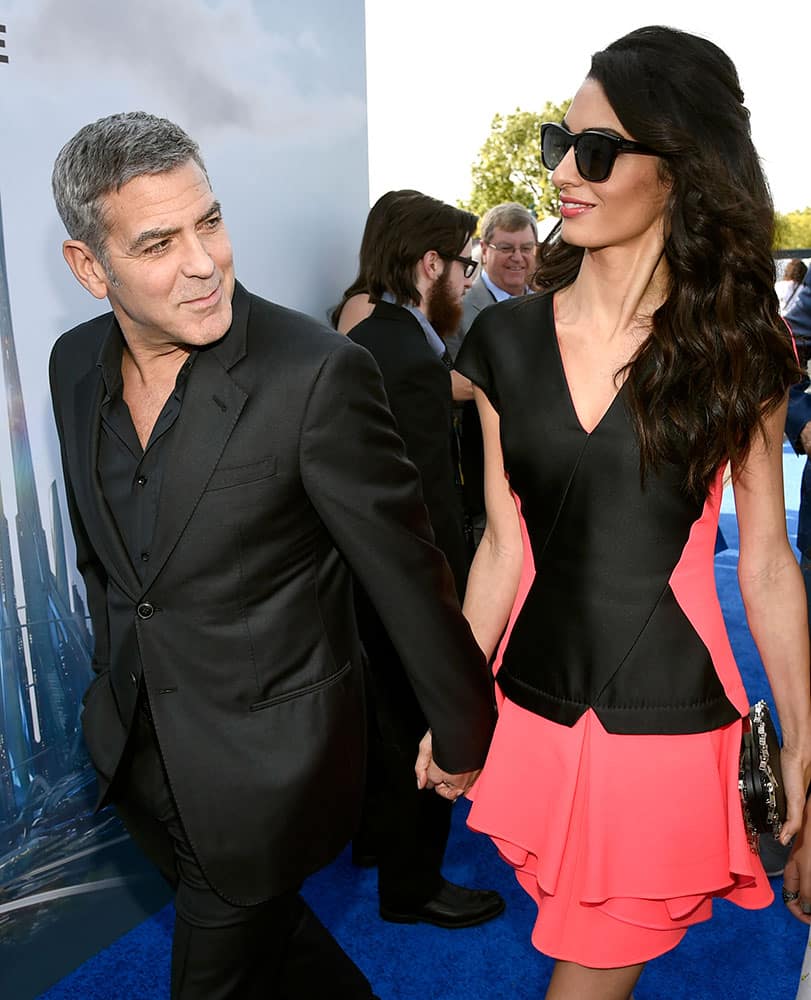 George Clooney, left, and Amal Clooney arrive at the world premiere of 