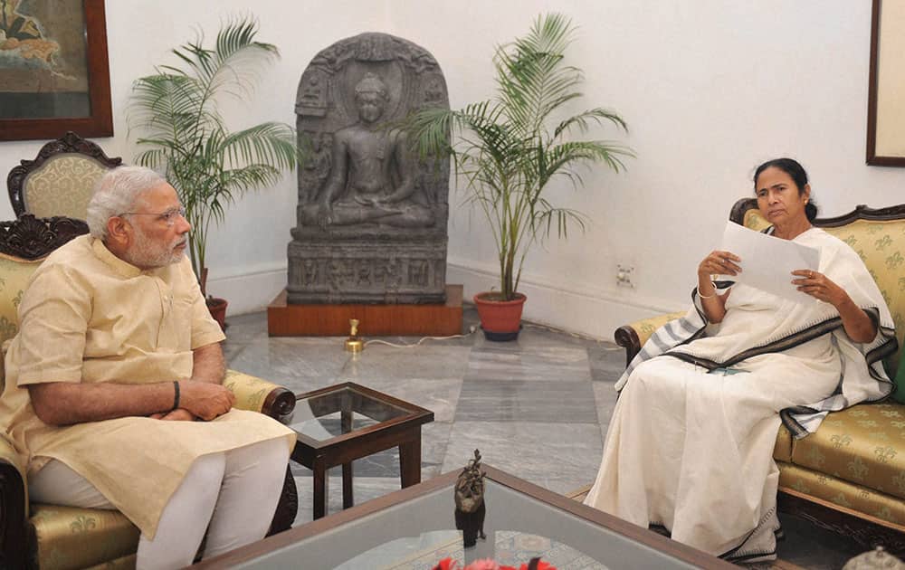 Prime Minister Narendra Modi meeting with Chief Minister of West Bengal, Mamata Banerjee at Raj Bhawan.