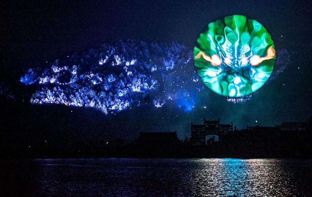 A multimedia show plays around the New Yuanmingyuan in Dongyang city in eastern China's Zhejiang Province