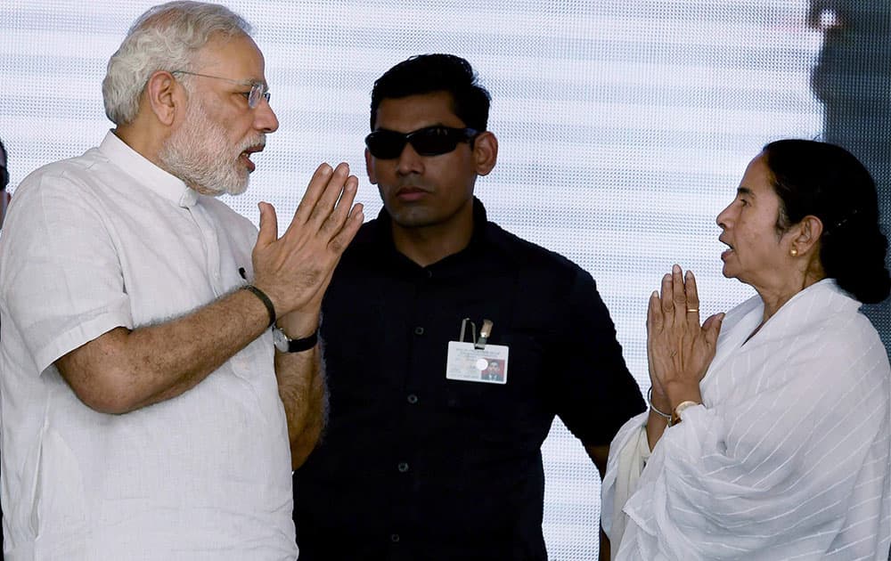 Prime Minister Narendra Modi and West Bengal Chief Minister Mamata Banerjee during the dedication ceremon of the Modernized and expanded IISCO Steel Plant to the nation at Polo Ground in Asansol.