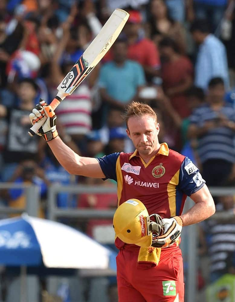 Royal Challengers Bangalore batsman De Villiers celebrates his century against Mumbai Indians during an IPL T20 match in Mumbai.