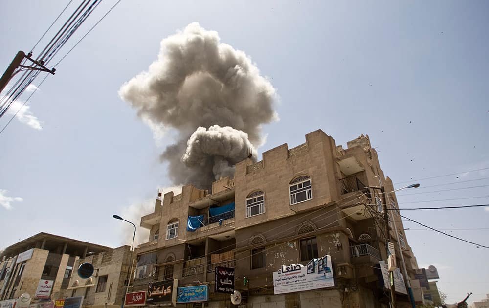Smoke rises from a house of former Yemeni president Ali Abdullah Saleh after a Saudi-led airstrike in Sanaa, Yemen.