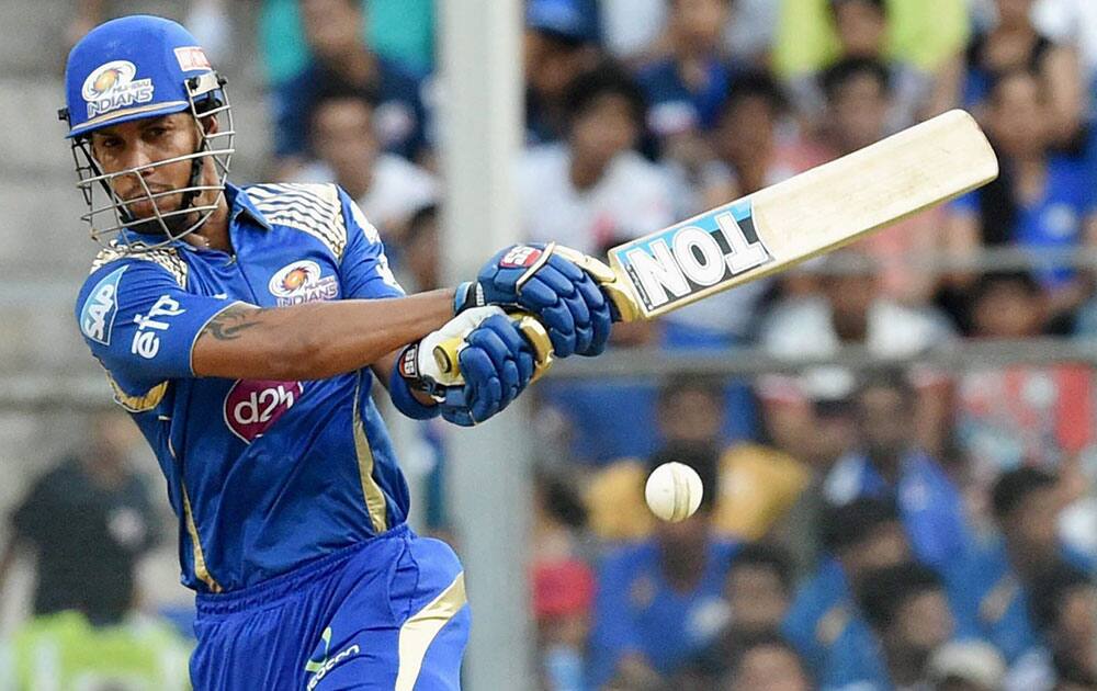 Mumbai Indians batsman Lendl Simmons plays a shot against Royal Challengers Bangalore during an IPL T20 match in Mumbai.