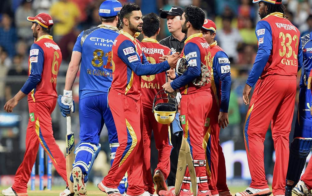 Royal Challengers Bangalore celebrate their win against Mumbai Indians during an IPL T20 match in Mumbai