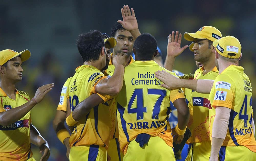 Chennai Super Kings’ Mohit Sharma celebrates with teammates after dismissing Rajasthan Royals Ajinkya Rahane during their IPL-2015 at MAC Stadium in Chennai.