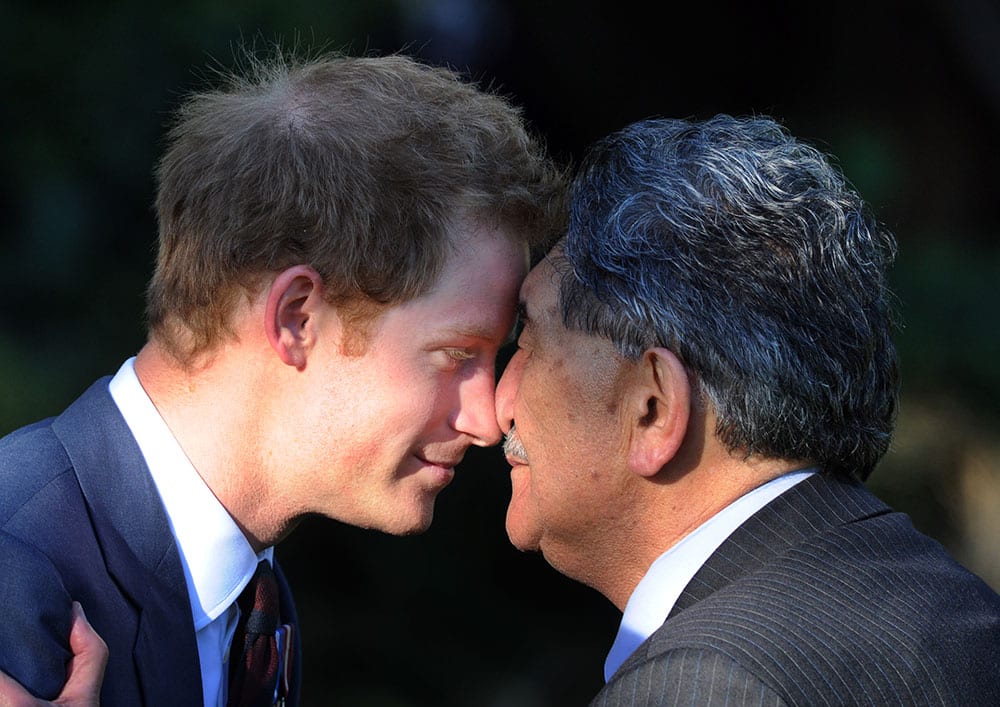 Britain's Prince Harry receives a traditional Maori greeting called hongi, from Kaumatua (Maori tribal elder) Lewis Moeau during a welcome ceremony at Government House, in Wellington, New Zealand.