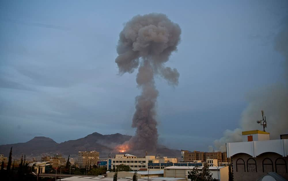 Smoke rises after a Saudi-led airstrike hit a site believed to be a munitions storage, in Yemen's capital, Sanaa.