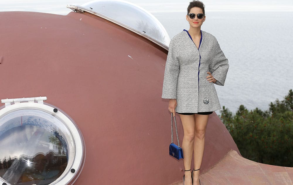 French actress Marion Cotillard arrives at the Dior Resort 2015 catwalk show presented in Cannes, southeastern France.