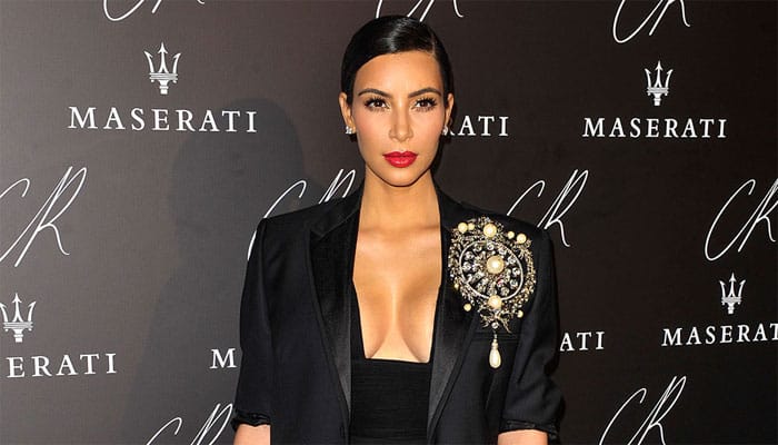 Kim K poses naked with &#039;only white paint&#039; covering her modesty