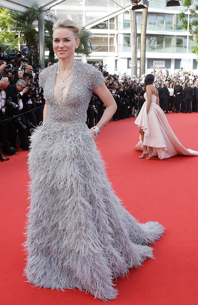 Actress Naomi Watts poses for photographers as she arrives for the opening ceremony and the screening of the film La Tete Haute (Standing Tall) at the 68th international film festival, Cannes.